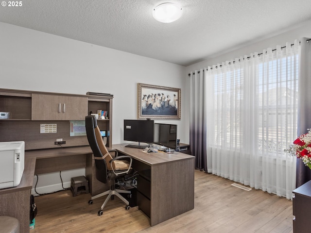 4745 S 19th St, Ridgefield, WA 98642 - office with visible vents, a textured ceiling, and light wood-style flooring