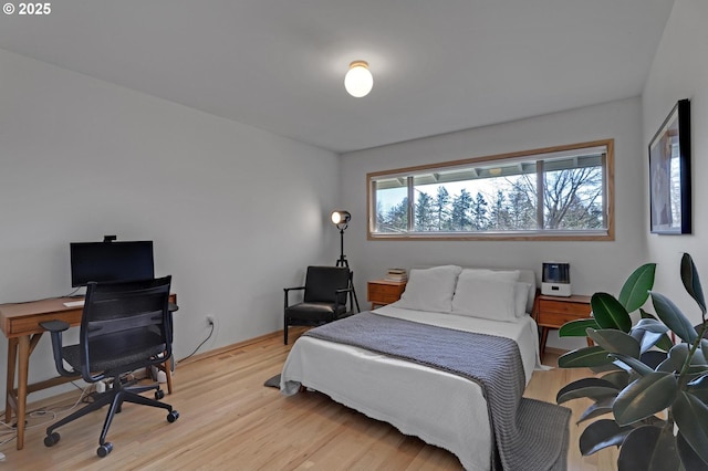 bedroom featuring light wood-type flooring