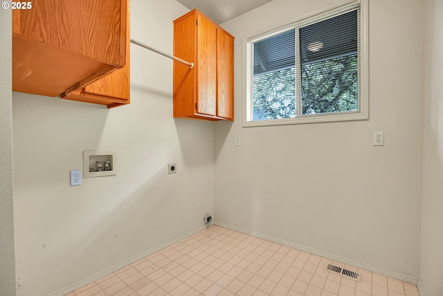 4698 Black Forest Ct, Lake Oswego, OR 97035 - washroom with cabinet space, hookup for a washing machine, baseboards, and hookup for an electric dryer