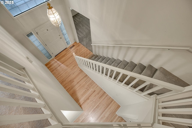 4698 Black Forest Ct, Lake Oswego, OR 97035 - stairway featuring wood finished floors