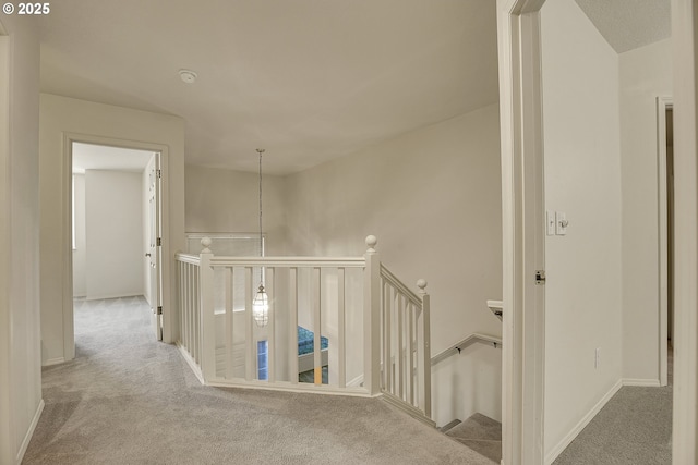 4698 Black Forest Ct, Lake Oswego, OR 97035 - hall featuring an upstairs landing, carpet flooring, and baseboards