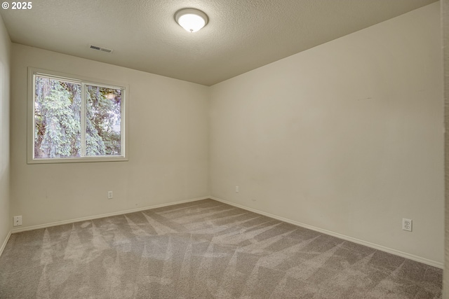 4698 Black Forest Ct, Lake Oswego, OR 97035 - unfurnished room featuring carpet floors, a textured ceiling, and baseboards