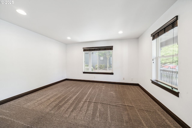 1904 SW 144th Ave, Beaverton, OR 97005 - carpeted empty room with recessed lighting, baseboards, and plenty of natural light
