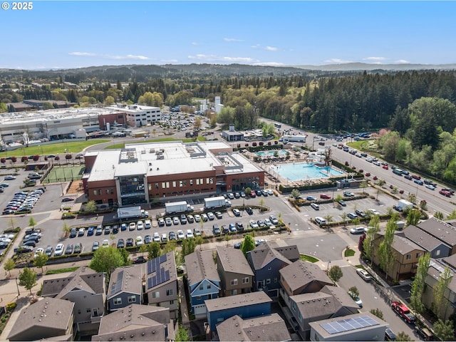 aerial view featuring a view of trees