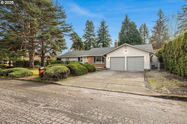 single story home featuring a garage