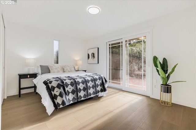 bedroom featuring wood-type flooring