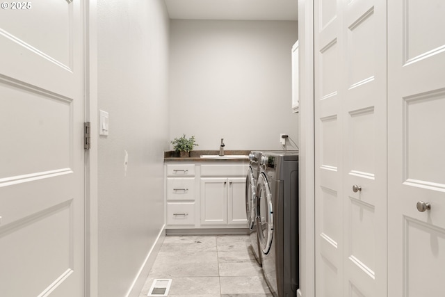 1314 NW Abernethy Rd, Portland, OR 97229 - washroom featuring cabinet space and washing machine and dryer