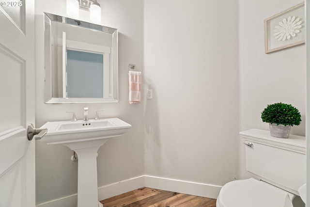 1314 NW Abernethy Rd, Portland, OR 97229 - bathroom with baseboards and wood finished floors