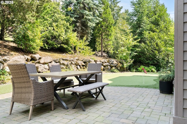 1314 NW Abernethy Rd, Portland, OR 97229 - view of patio with a putting area and outdoor dining space