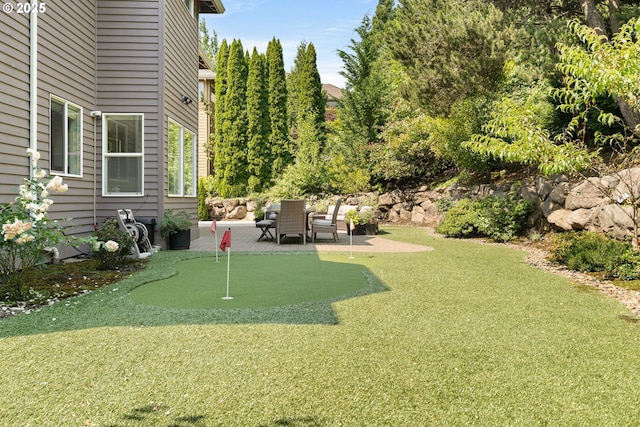 1314 NW Abernethy Rd, Portland, OR 97229 - view of yard with an area to practice putting and a patio area