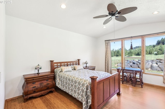 52135 E Terra Fern Dr, Sandy, OR 97055 - bedroom with vaulted ceiling, light wood-style floors, recessed lighting, and a ceiling fan