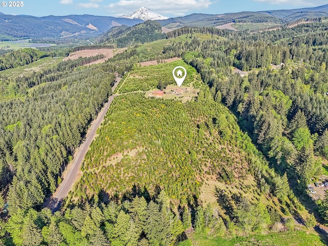 52135 E Terra Fern Dr, Sandy, OR 97055 - view of property location with a heavily wooded area and a mountainous background