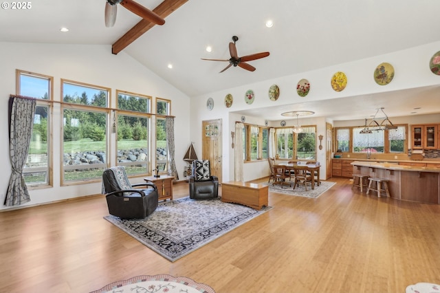 52135 E Terra Fern Dr, Sandy, OR 97055 - living room featuring ceiling fan, light wood-style floors, beam ceiling, high vaulted ceiling, and recessed lighting