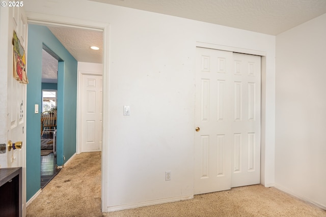 1280 Peets Ct, Eugene, OR 97402 - unfurnished bedroom with carpet floors, a closet, a textured ceiling, and recessed lighting