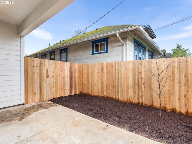 exterior space featuring a patio and fence