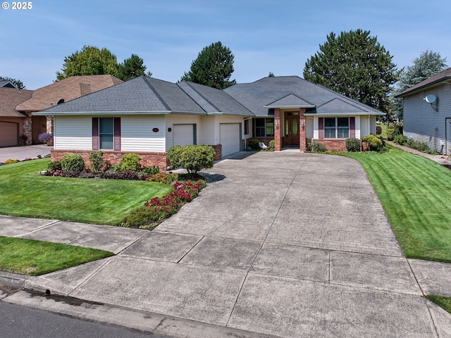 2411 Meridian Dr, Woodburn, OR 97071 - view of front facade featuring an attached garage, brick siding, driveway, and a front lawn