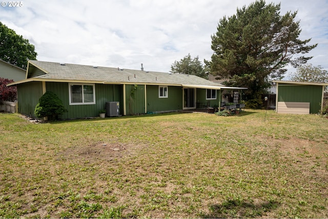 1630 SW Riverhill Dr, Hermiston, OR 97838 - back of property with central air condition unit, a yard, and a patio area