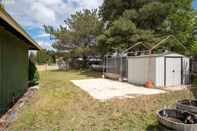 1630 SW Riverhill Dr, Hermiston, OR 97838 - view of yard featuring a shed, a patio, and an outbuilding