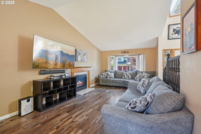 4055 NE 13th Ter, Gresham, OR 97030 - living area with lofted ceiling, dark wood finished floors, a fireplace with flush hearth, and baseboards