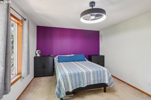 4055 NE 13th Ter, Gresham, OR 97030 - bedroom featuring carpet flooring, baseboards, and a textured ceiling