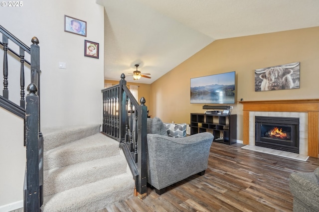 4055 NE 13th Ter, Gresham, OR 97030 - living area with vaulted ceiling, wood finished floors, ceiling fan, a fireplace, and stairway