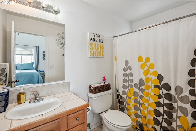 12631 SE Division St, Portland, OR 97236 - ensuite bathroom with ensuite bathroom, toilet, curtained shower, and vanity