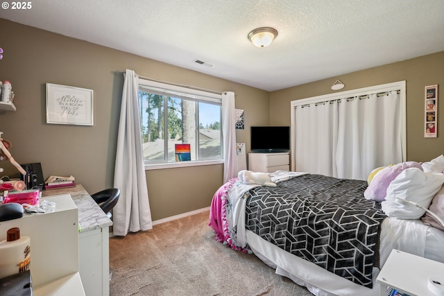 12631 SE Division St, Portland, OR 97236 - bedroom featuring baseboards, visible vents, light colored carpet, and a textured ceiling
