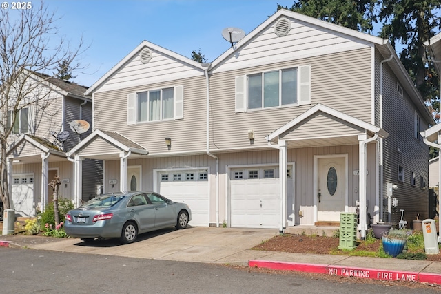 12631 SE Division St, Portland, OR 97236 - view of property with a garage and concrete driveway