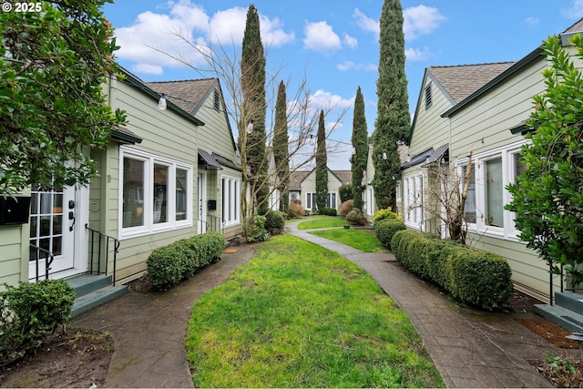 view of yard featuring entry steps