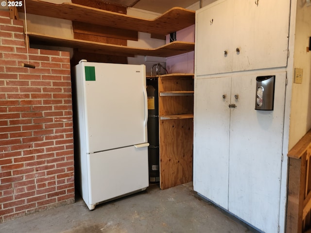 interior space with refrigerator and white fridge