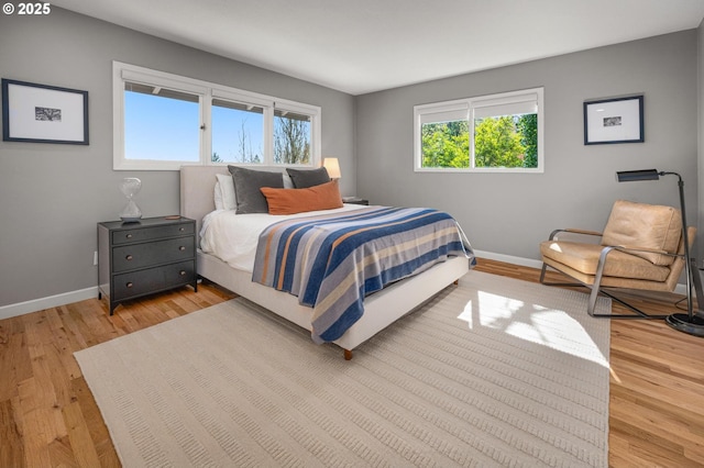 2631 SW Sherwood Dr, Portland, OR 97201 - bedroom with light wood finished floors and baseboards