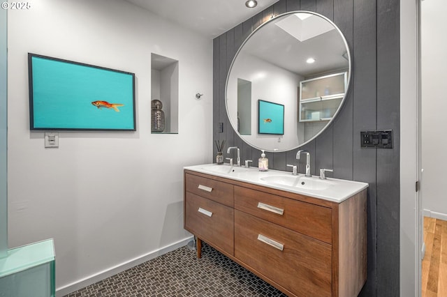 2631 SW Sherwood Dr, Portland, OR 97201 - full bathroom with recessed lighting, double vanity, baseboards, and a sink