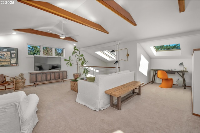 2631 SW Sherwood Dr, Portland, OR 97201 - carpeted living area with vaulted ceiling with skylight and ceiling fan