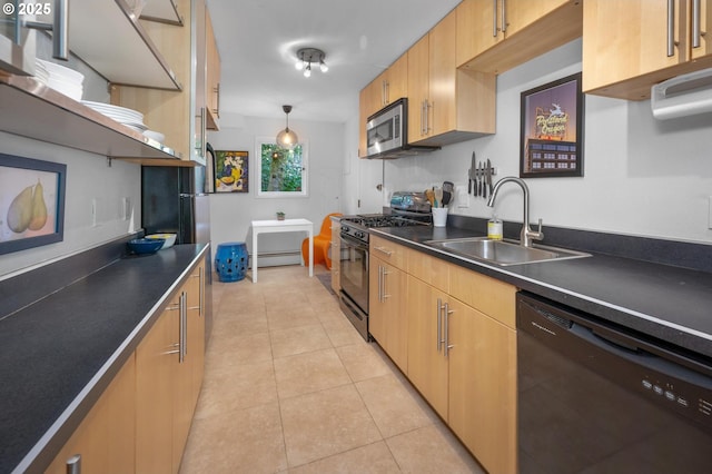 2631 SW Sherwood Dr, Portland, OR 97201 - kitchen featuring a sink, dark countertops, black appliances, a baseboard heating unit, and light tile patterned flooring