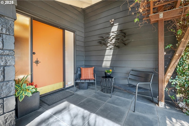 2631 SW Sherwood Dr, Portland, OR 97201 - view of exterior entry with a patio