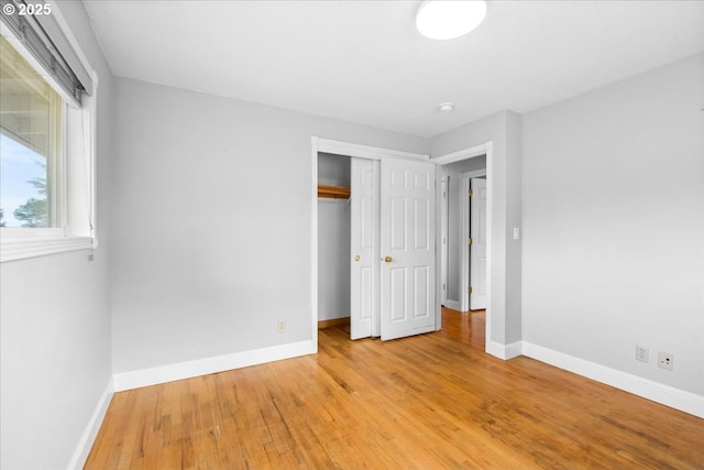 620 Sky Ln, Forest Grove, OR 97116 - unfurnished bedroom featuring light wood-style flooring and a closet
