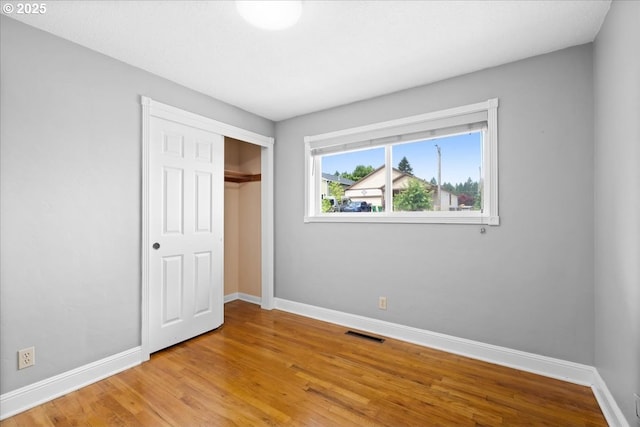 620 Sky Ln, Forest Grove, OR 97116 - unfurnished bedroom with light wood-style flooring and a closet