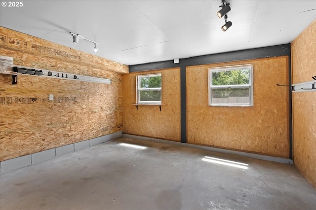 620 Sky Ln, Forest Grove, OR 97116 - empty room with rail lighting and concrete flooring