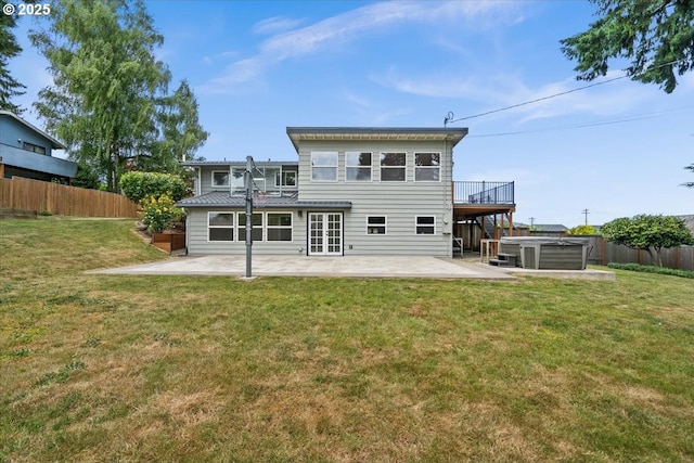 620 Sky Ln, Forest Grove, OR 97116 - rear view of house featuring a hot tub, a patio, and a deck