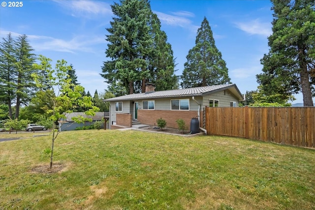 620 Sky Ln, Forest Grove, OR 97116 - view of front of house with a chimney and brick siding