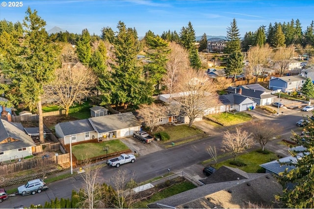 birds eye view of property with a residential view