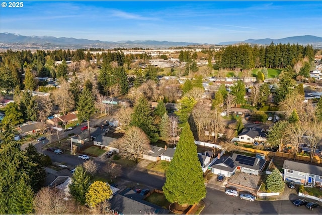 drone / aerial view with a mountain view and a residential view