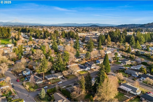 bird's eye view with a residential view and a mountain view