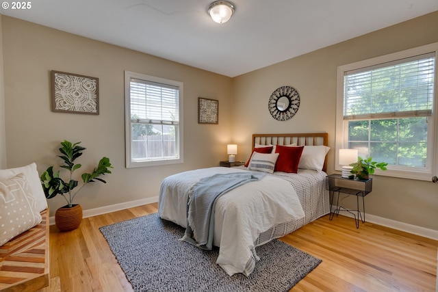 7067 N Dwight Ave, Portland, OR 97203 - bedroom with wood finished floors and baseboards