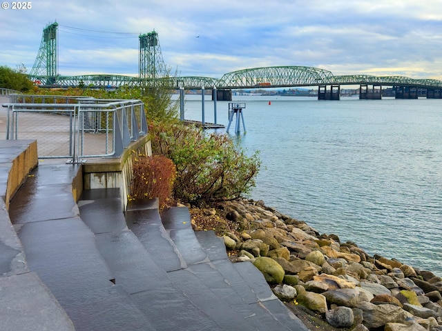 dock area with a water view