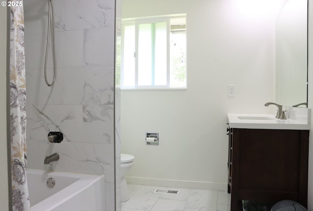 550 NE 20th Dr, Gresham, OR 97030 - bathroom featuring toilet, baseboards, vanity, shower / tub combo, and marble look tiles