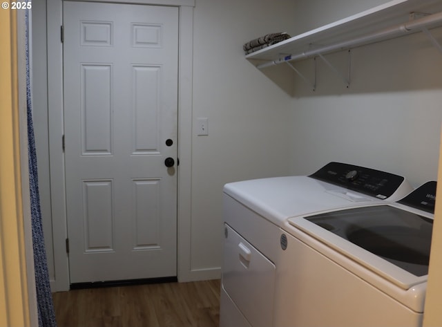 550 NE 20th Dr, Gresham, OR 97030 - laundry room with independent washer and dryer and dark wood finished floors