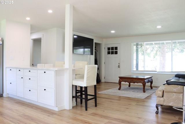 550 NE 20th Dr, Gresham, OR 97030 - living room featuring light wood-type flooring, recessed lighting, and baseboards