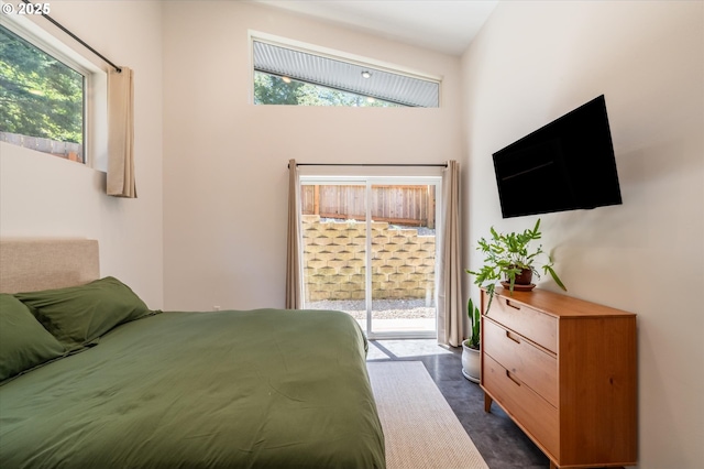 2345 Deady St, Port Orford, OR 97465 - bedroom featuring multiple windows and access to exterior