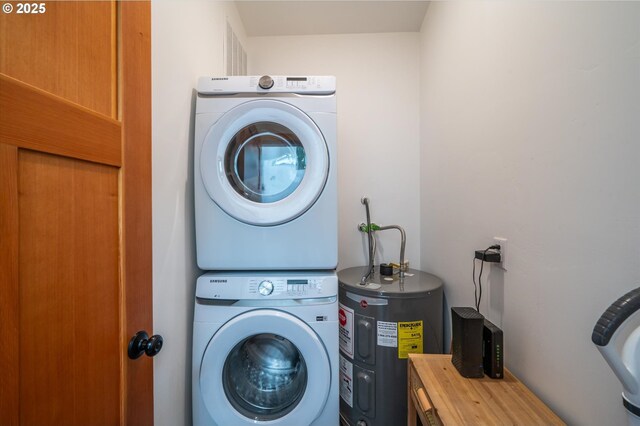 2345 Deady St, Port Orford, OR 97465 - laundry room featuring laundry area, stacked washer and dryer, and water heater